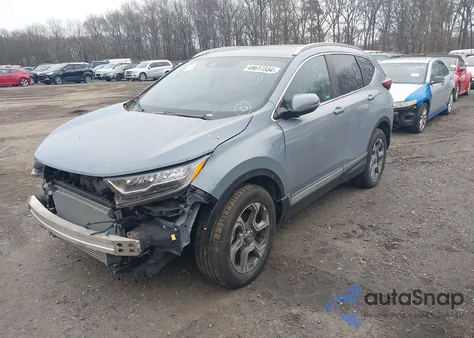 2021 Honda Cr-V Awd Touring from USA, damaged, VIN 2HKRW2H97MH662056